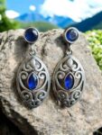 Elegant Silver Filigree Earrings with Marquise Blue Gem...