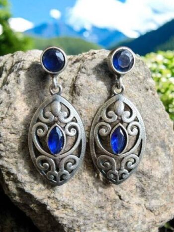 Elegant Silver Filigree Earrings with Marquise Blue Gem...